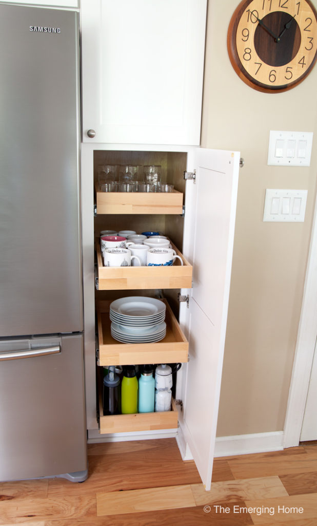 Open cabinet showing drawers that pull out to access the deep cabinet space.