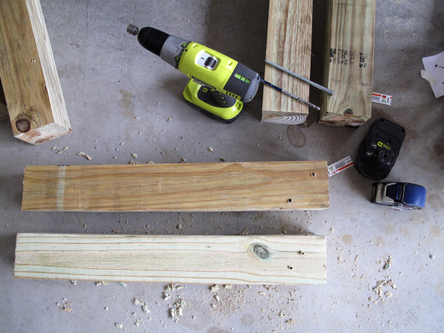 four-by-fours for the legs and frame of the rain barrel stand are shown predrilled 