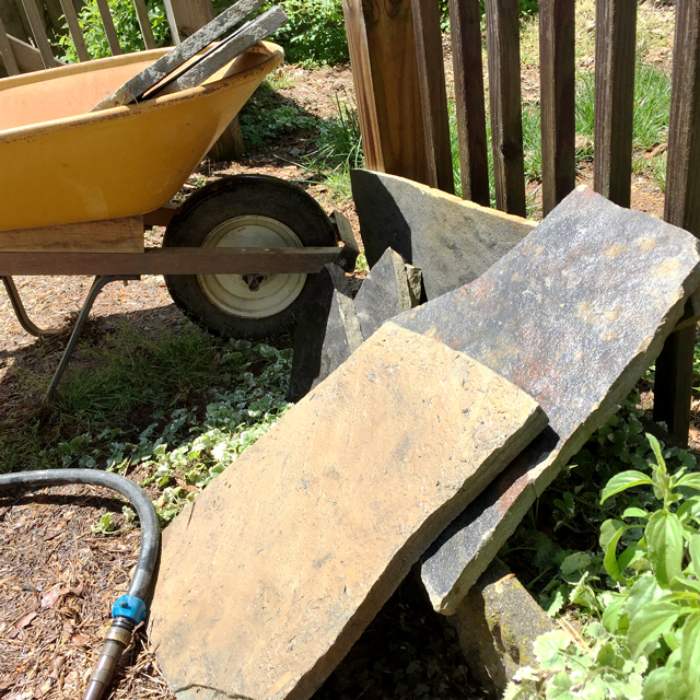 2 large pieces of flagstone, one is washed, one is muddy 