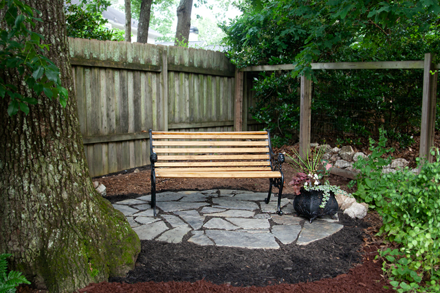 Bench sitting on flagstone