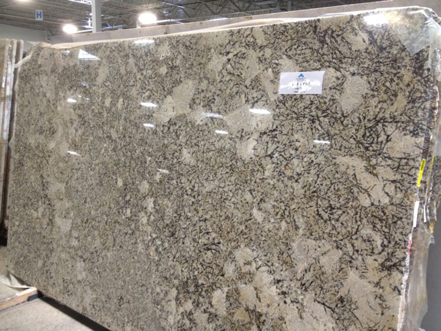 Predominantly gray, black and soft brown tones on large stone slab