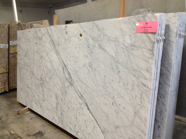 large slab of white marble with heavy pattern of gray veins