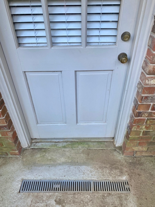 Catch basin is installed in front of basement door