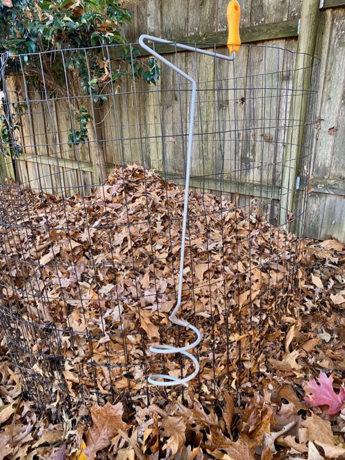 a metal screw shaped tool used to separate decomposing leaves