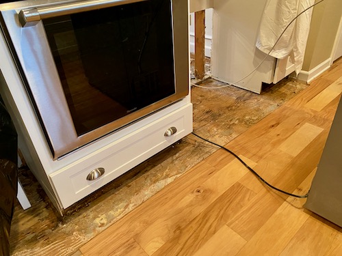 Water Damaged Wood Floors From Refrigerator Water Line Leak - The
